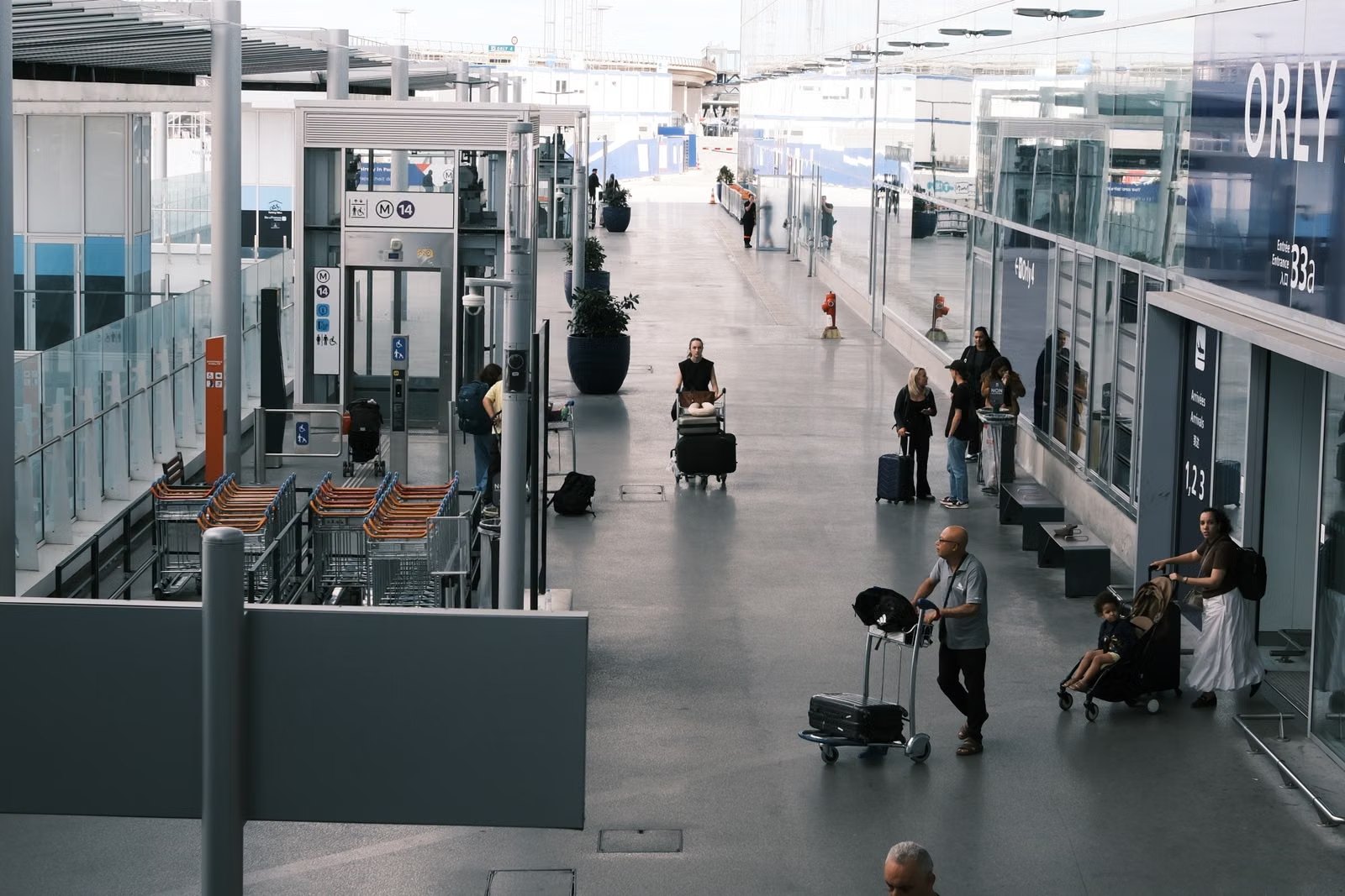 Business travellers moving through airport